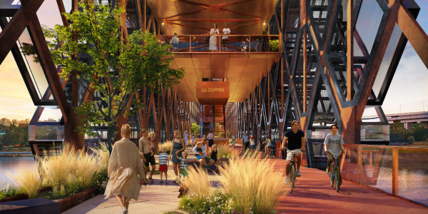 People walk on the pedestrian-bicycle bridge