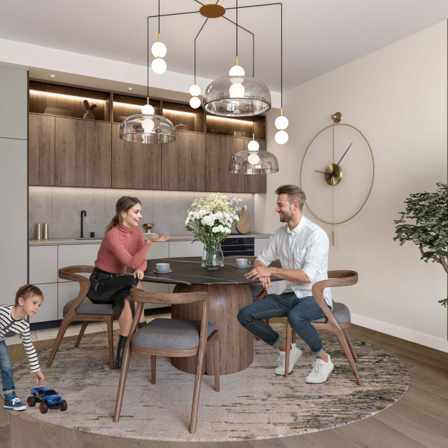 Open-plan kitchen and dining area with built-in kitchen elements.