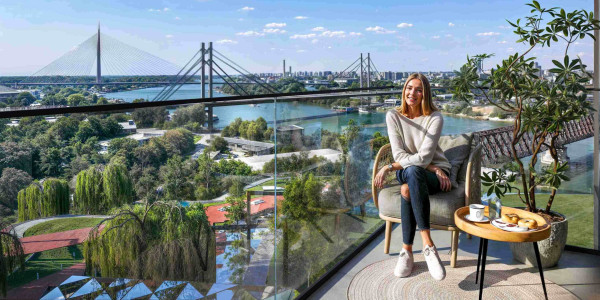 The terrace in the BW Sava building with a view of the river and the Linear Park.